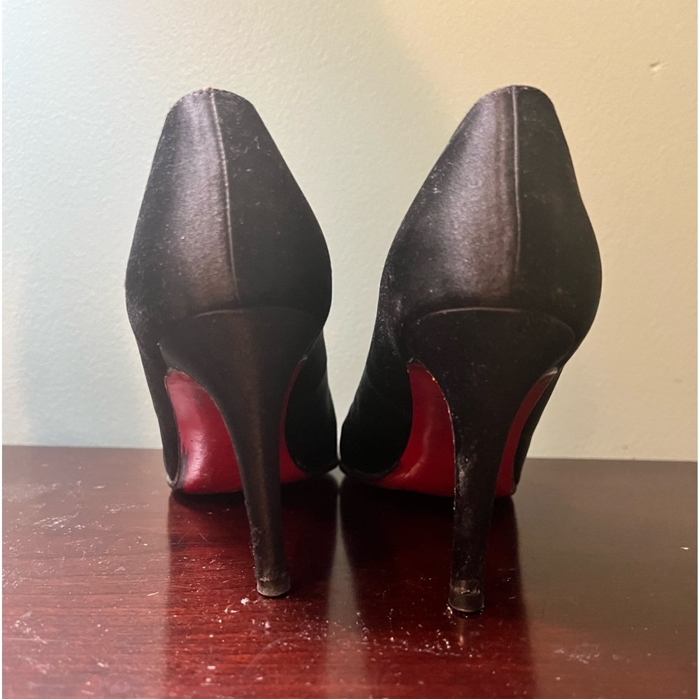 Christian Louboutin (Red Bottims) Authentic satin heels.